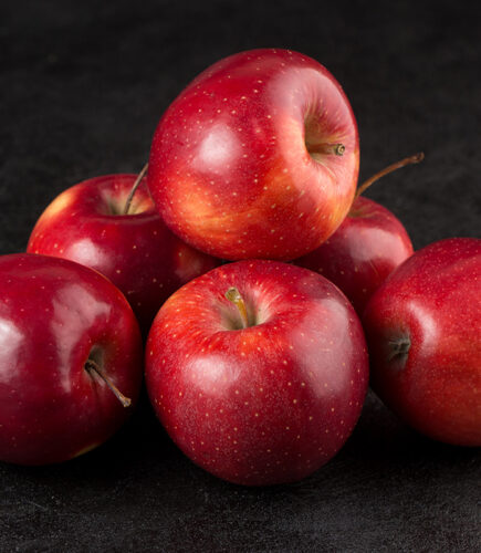 fruits several fresh ripe red apples on grey desk